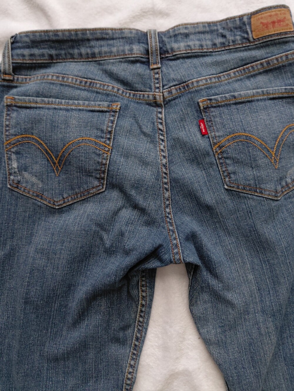 Levi's Men's Light Blue Slim Jeans with Signature Back Pockets